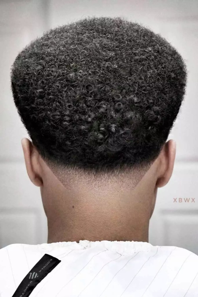 Medium Afro With Low Fade Black Men Haircuts #blackmenhaircuts #blackmenhairstyles #haircutsforblackmen #afrohaircuts #afrohairstyles